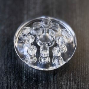 Vintage glass flower frog 11 eleven holes with large center hole